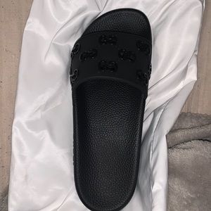 I am selling Black classic Gucci slides they are a size 8 brand new